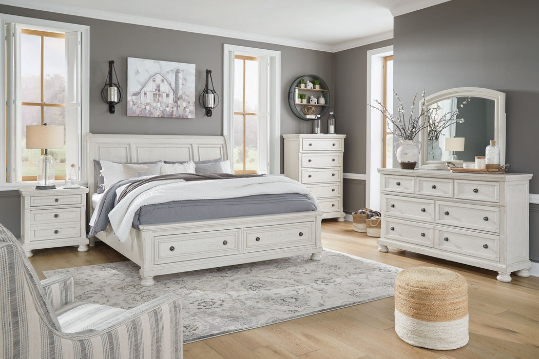 Robbinsdale - 8 Pc. - Dresser, Mirror, Chest, King Sleigh Bed with 2 Storage Drawers, 2 Nightstands - Antique White