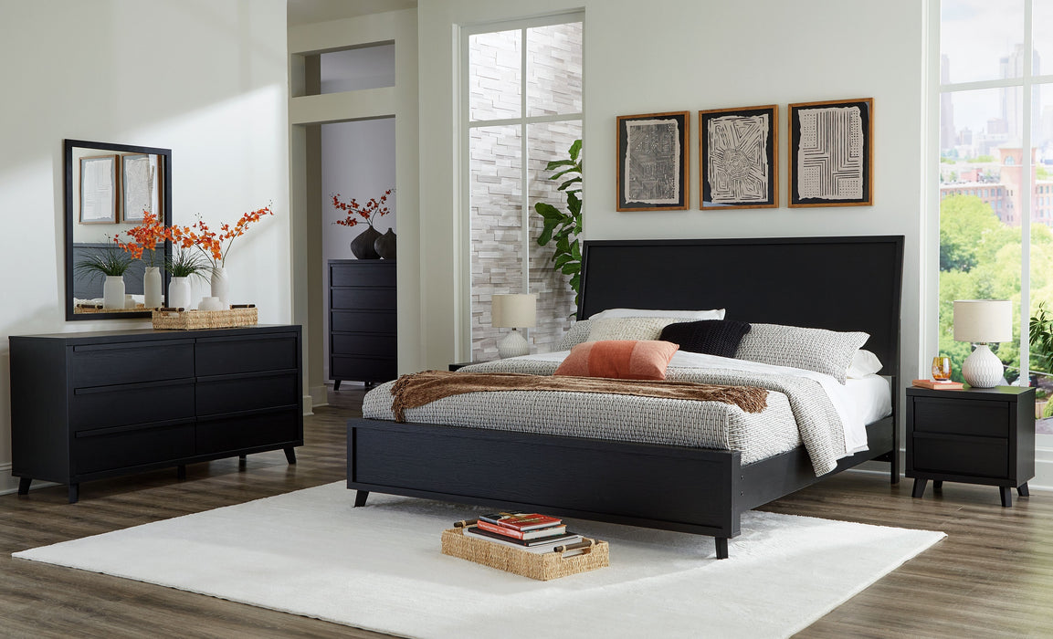 Danziar - 9 Pc. - Dresser, Mirror, Chest, King Panel Bed, 2 Nightstands - Black