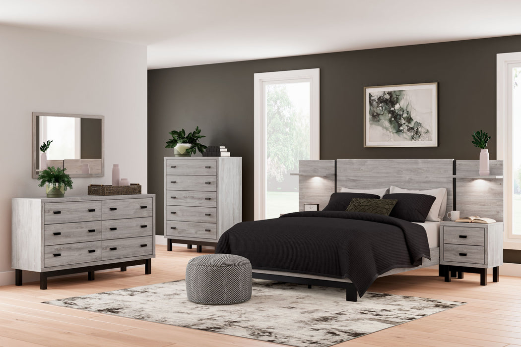 Vessalli - 9 Pc. - Dresser, Mirror, Chest, Queen Panel Bed With Extensions, 2 Nightstands - Gray