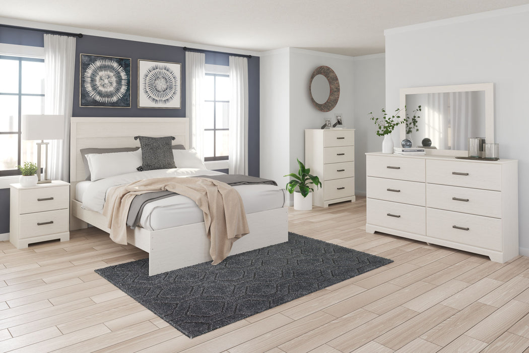 Stelsie - 7 Pc. - Dresser, Mirror, Chest, King Panel Bed, 2 Nightstands - White