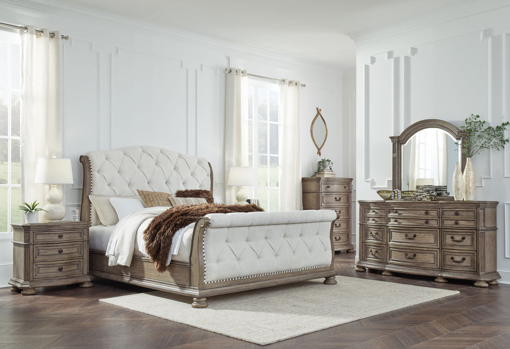Ardenfield - 7 Pc. - Dresser, Mirror, California King Upholstered Sleigh Bed, 2 Nightstands - Light Brown